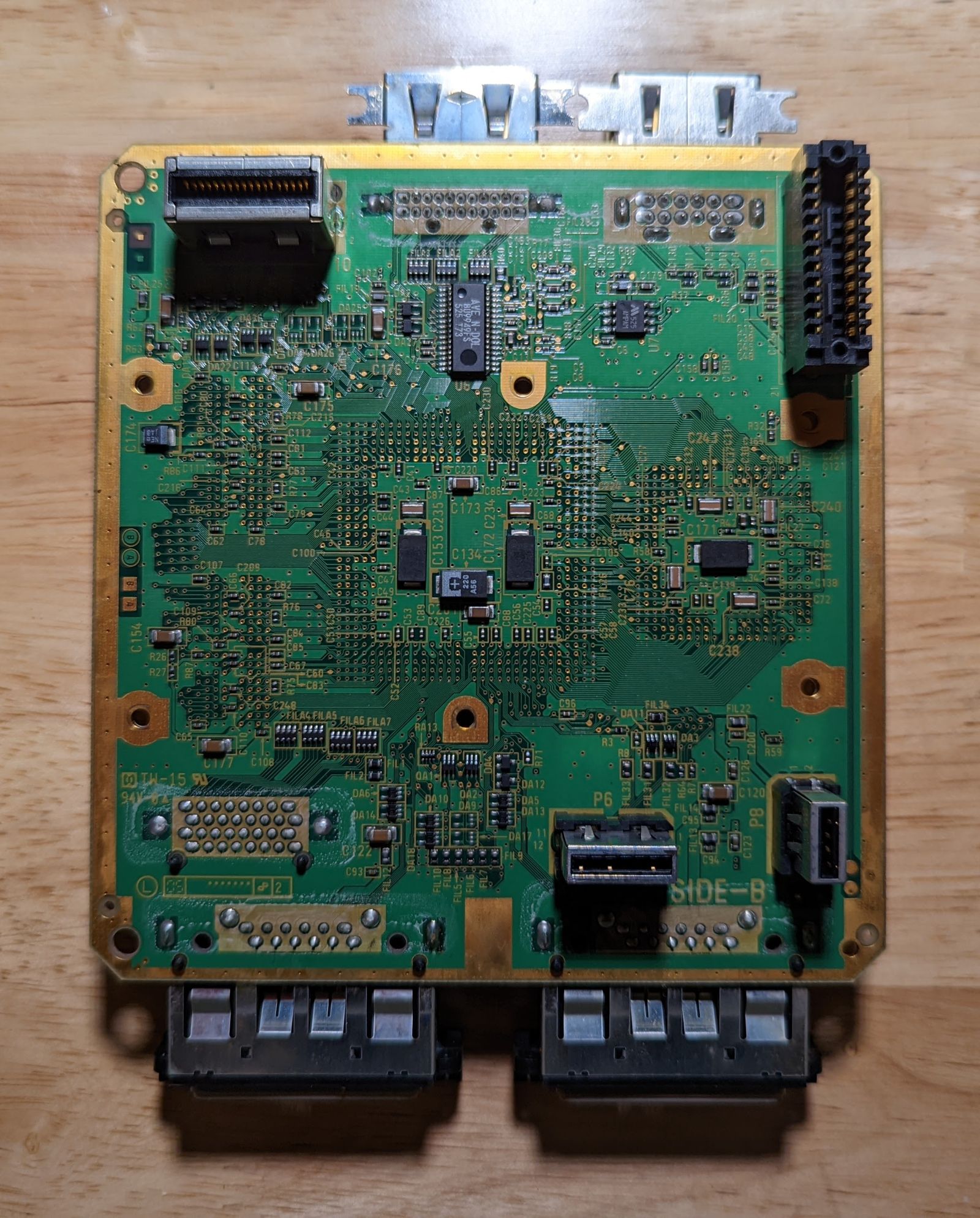 Photo of Triforce main board, bottom view. Labeled 'Side-B'.